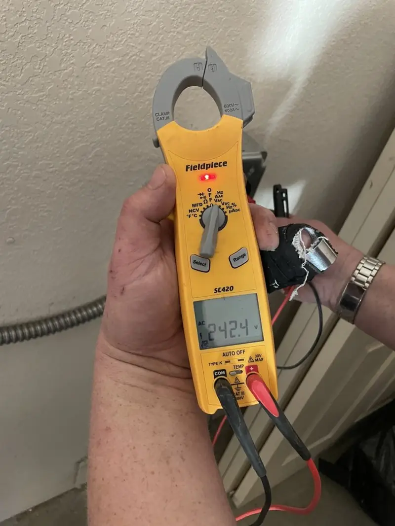Voltage testing with clamp meter during Hot Tub / Pool Electrical Wiring in Bartlesville
